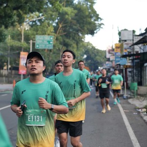 Race photo from BAUR RUN 2025