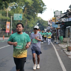 Race photo from BAUR RUN 2025