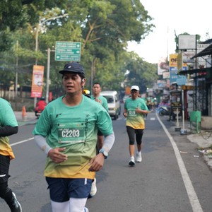 Race photo from BAUR RUN 2025