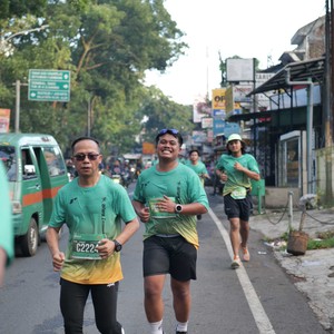 Race photo from BAUR RUN 2025