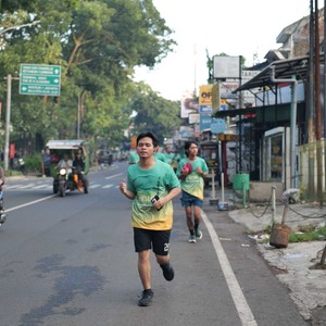 Race photo from BAUR RUN 2025