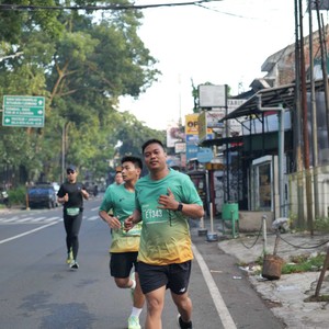 Race photo from BAUR RUN 2025