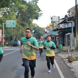 Race photo from BAUR RUN 2025