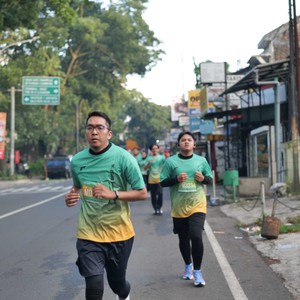 Race photo from BAUR RUN 2025
