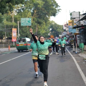Race photo from BAUR RUN 2025