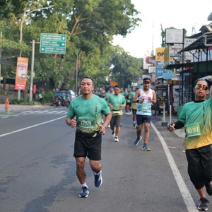 Race photo from BAUR RUN 2025