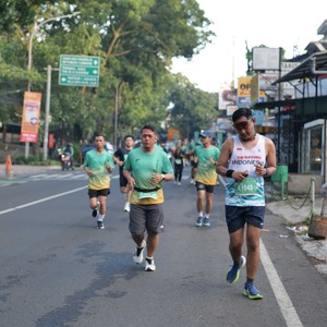 Race photo from BAUR RUN 2025