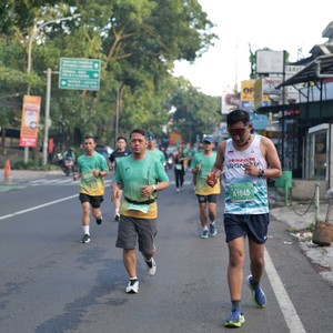 Race photo from BAUR RUN 2025