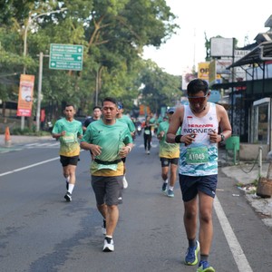 Race photo from BAUR RUN 2025