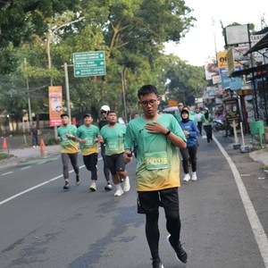 Race photo from BAUR RUN 2025