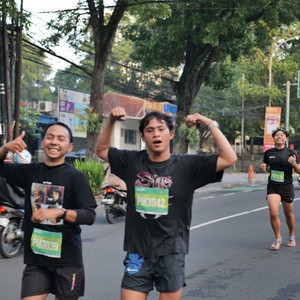Race photo from BAUR RUN 2025