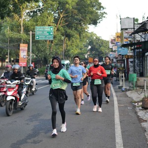 Race photo from BAUR RUN 2025