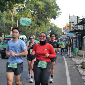Race photo from BAUR RUN 2025