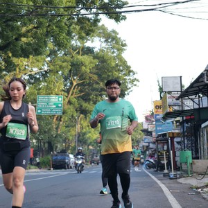 Race photo from BAUR RUN 2025