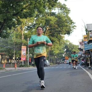 Race photo from BAUR RUN 2025