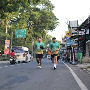 Race photo from BAUR RUN 2025