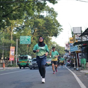 Race photo from BAUR RUN 2025