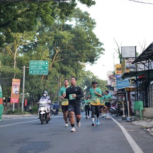 Race photo from BAUR RUN 2025