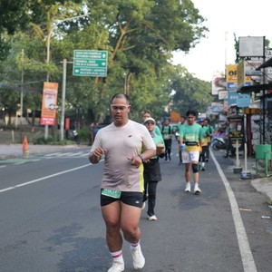 Race photo from BAUR RUN 2025