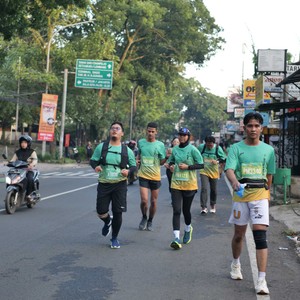 Race photo from BAUR RUN 2025