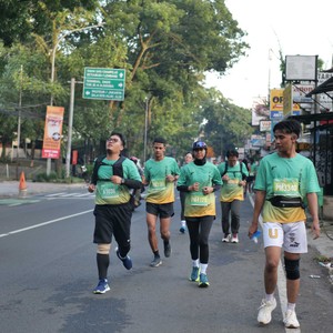 Race photo from BAUR RUN 2025