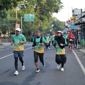 Race photo from BAUR RUN 2025