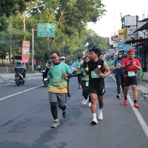 Race photo from BAUR RUN 2025