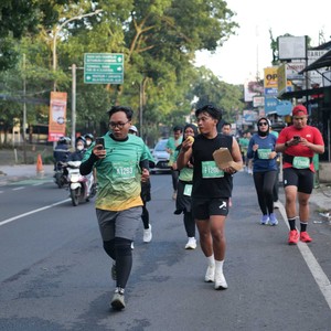 Race photo from BAUR RUN 2025