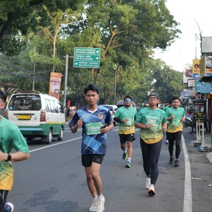 Race photo from BAUR RUN 2025