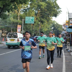 Race photo from BAUR RUN 2025