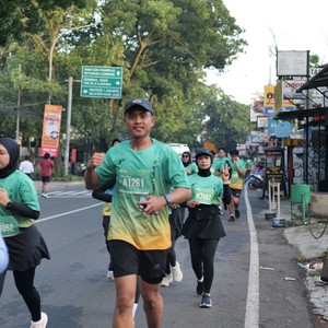 Race photo from BAUR RUN 2025