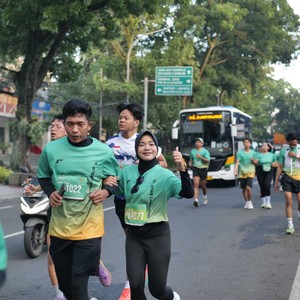 Race photo from BAUR RUN 2025