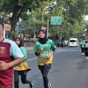 Race photo from BAUR RUN 2025