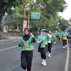 Race photo from BAUR RUN 2025