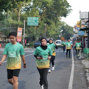Race photo from BAUR RUN 2025