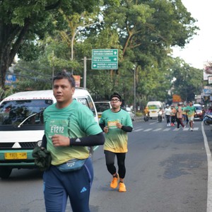 Race photo from BAUR RUN 2025