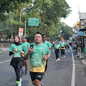 Race photo from BAUR RUN 2025