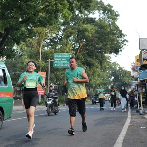 Race photo from BAUR RUN 2025