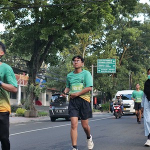 Race photo from BAUR RUN 2025