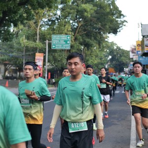 Race photo from BAUR RUN 2025
