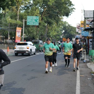 Race photo from BAUR RUN 2025