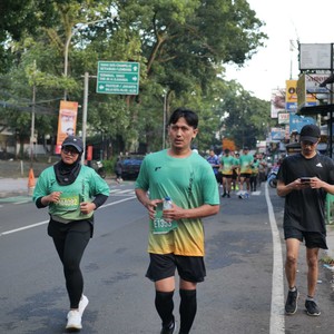 Race photo from BAUR RUN 2025