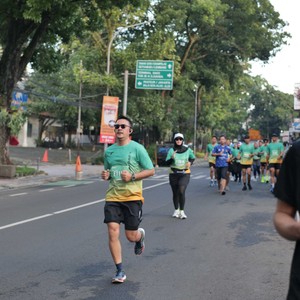 Race photo from BAUR RUN 2025