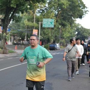 Race photo from BAUR RUN 2025