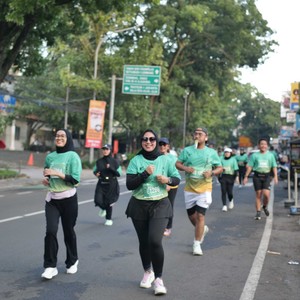 Race photo from BAUR RUN 2025