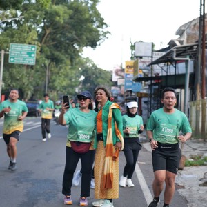 Race photo from BAUR RUN 2025