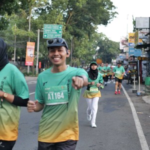 Race photo from BAUR RUN 2025
