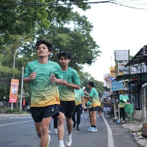 Race photo from BAUR RUN 2025