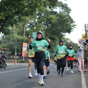 Race photo from BAUR RUN 2025
