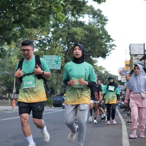 Race photo from BAUR RUN 2025